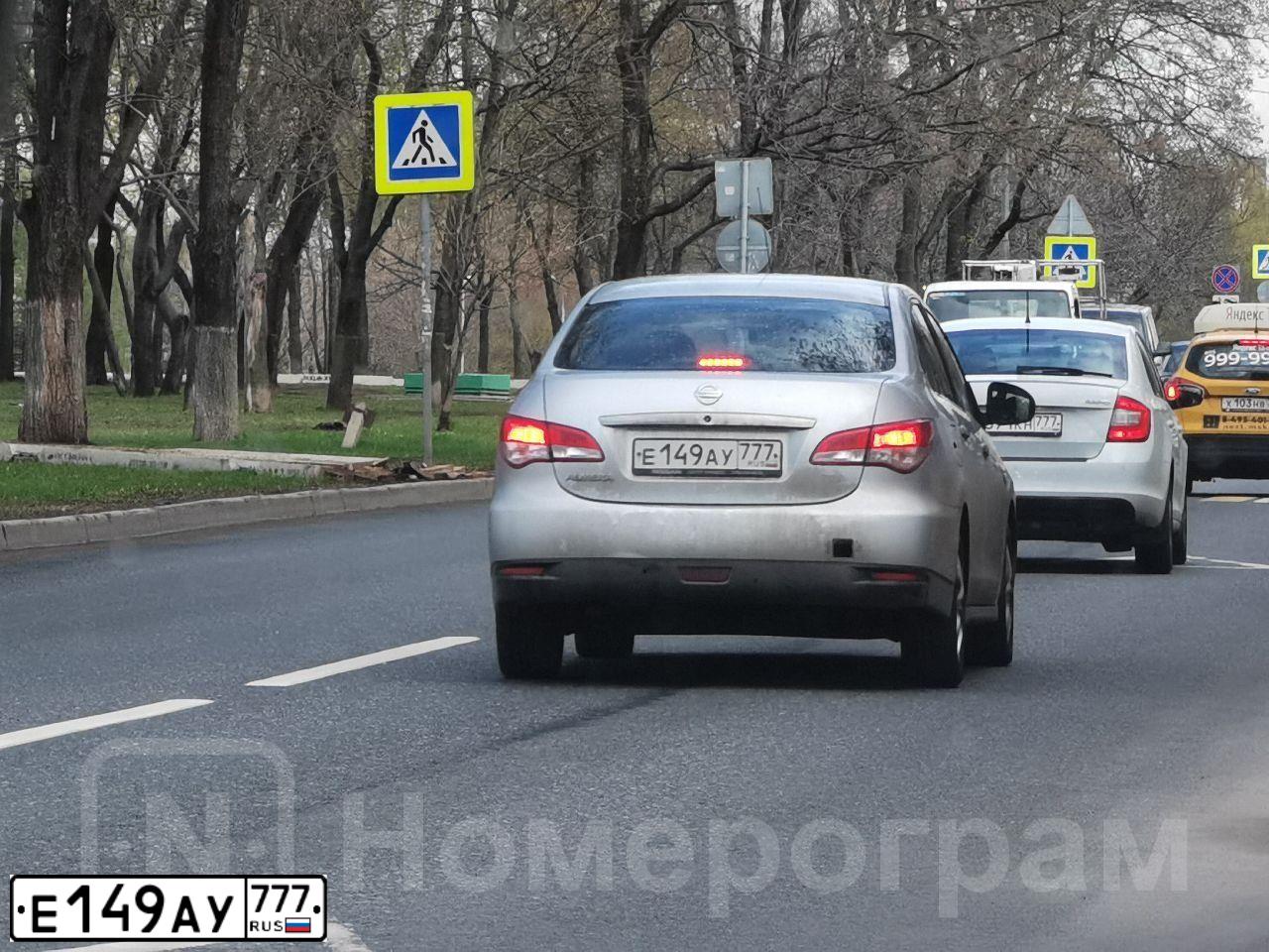 Фото автомобиля NISSAN ALMERA /AVTOVAZ/, 2013 — госномер Е149АУ777. Цвет: СЕРЕБРИСТЫЙ