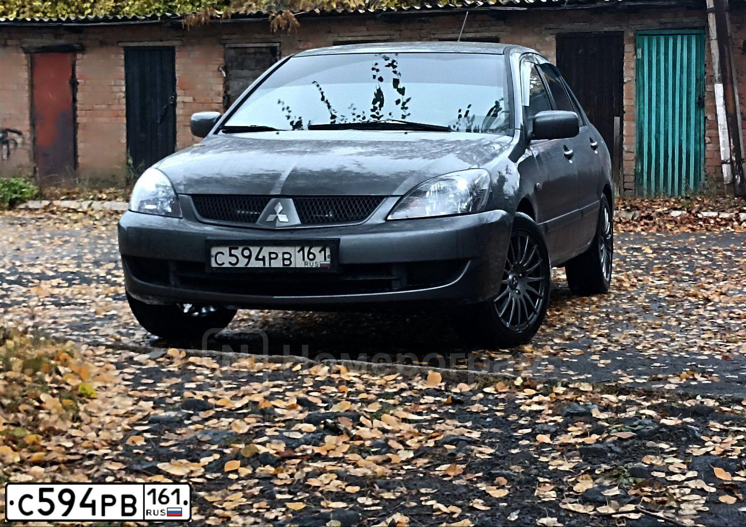 Фото автомобиля MITSUBISHI LANCER, 2006 — госномер С594РВ161. Цвет: Серый