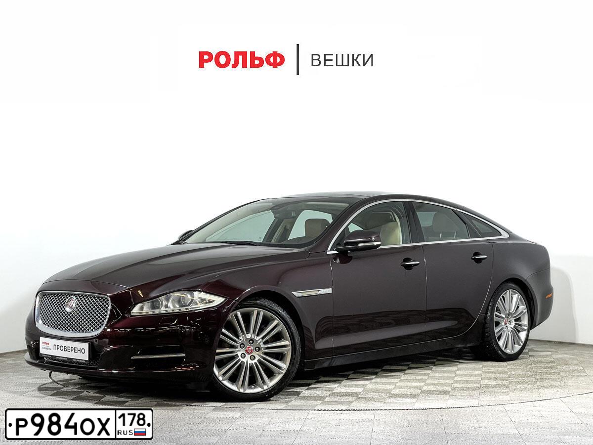 Фото автомобиля JAGUAR XJ, 2014 — госномер Е092АР147. Цвет: Коричневый