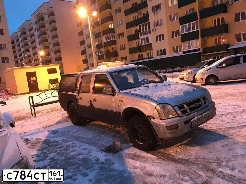 Фото автомобиля XINKAI NXK 1021, 2004 — госномер О113ХА123. Цвет: СЕРЫЙ