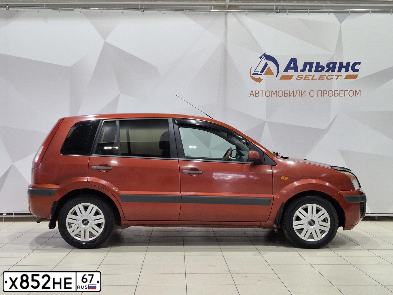 Фото автомобиля FORD FUSION, 2007 — госномер Х852НЕ67. Цвет: Красный