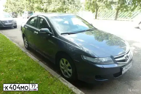 Фото автомобиля MAZDA 626, 1993 — госномер К404МО77. Цвет: Красный