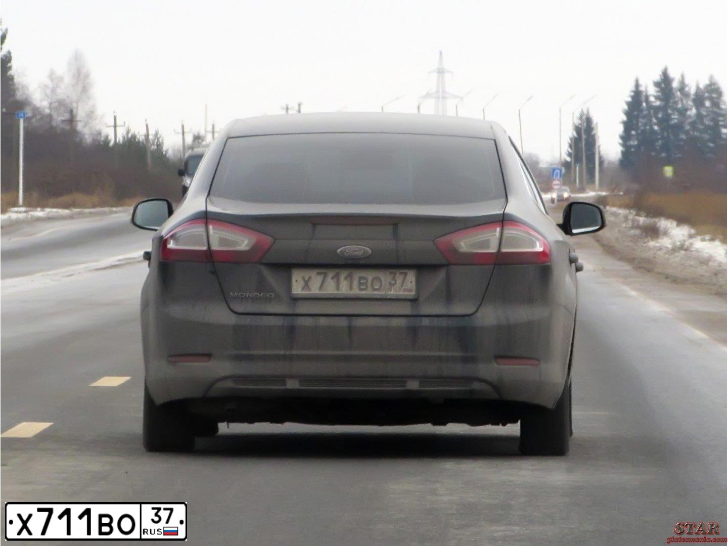 Фото автомобиля FORD MONDEO, 2012 — госномер Х711ВО37. Цвет: ЧЕРНЫЙ