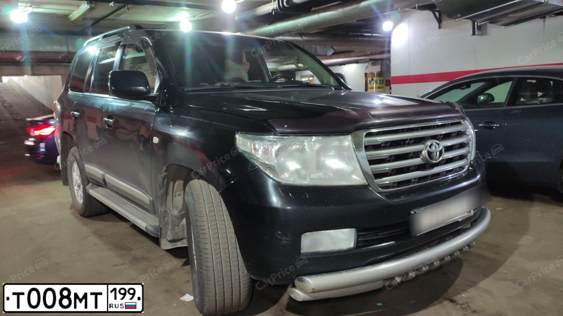 Фото автомобиля VOLKSWAGEN TOUAREG, 2006 — госномер Т008МТ199. Цвет: ЧЕРНЫЙ