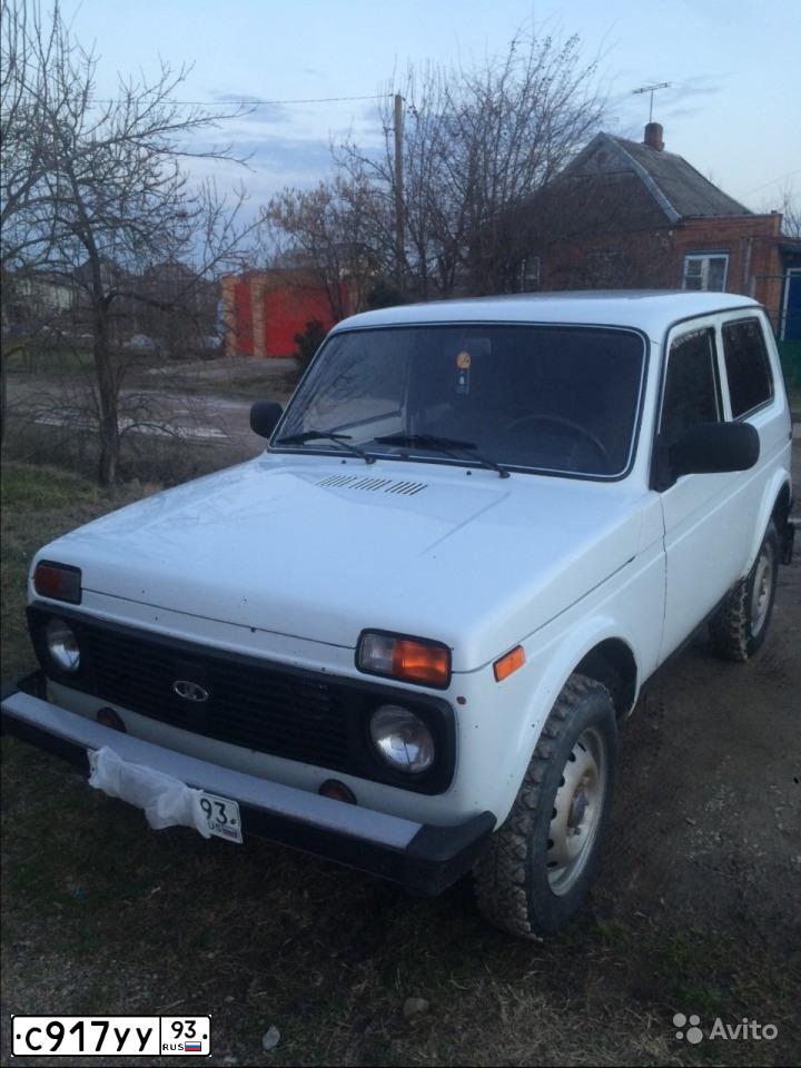 Фото автомобиля LADA 2121 NIVA, 2011 — госномер Е467АУ82. Цвет: ЯРКО-БЕЛЫЙ