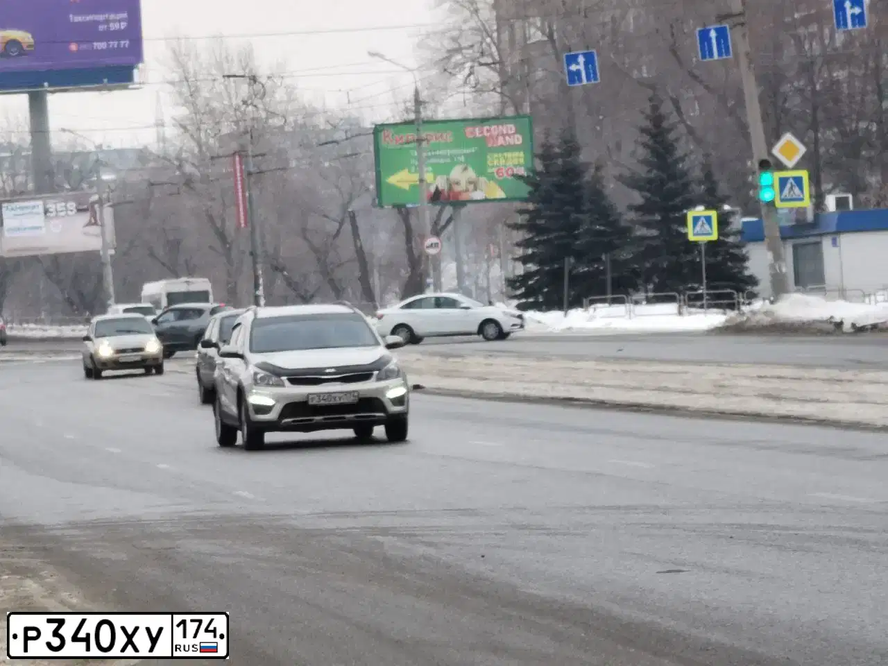 Фото автомобиля KIA RIO, 2019 — госномер Р340ХУ174. Цвет: БЕЖЕВЫЙ