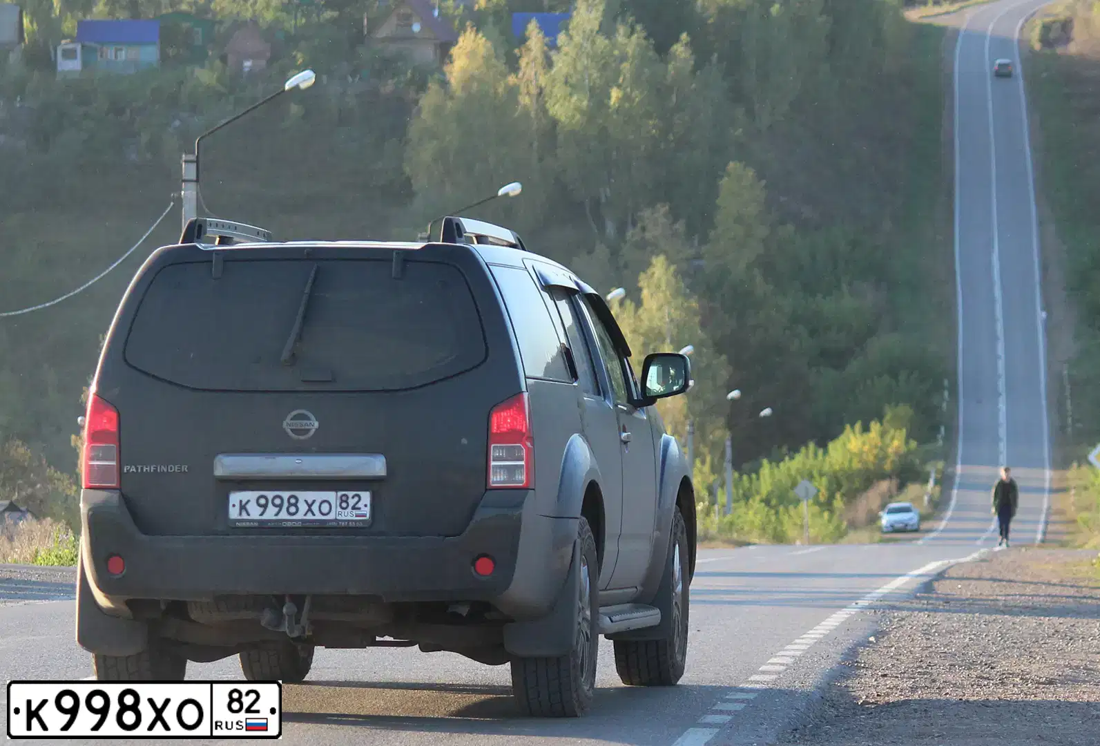 Фото автомобиля NISSAN PATHFINDER, 2009 — госномер Н237МТ178. Цвет: ЧЕРНЫЙ