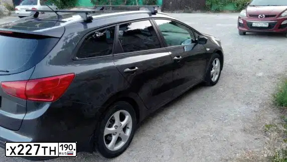 Фото автомобиля MAZDA CX-7, 2011 — госномер Х227ТН190. Цвет: КРАСНЫЙ