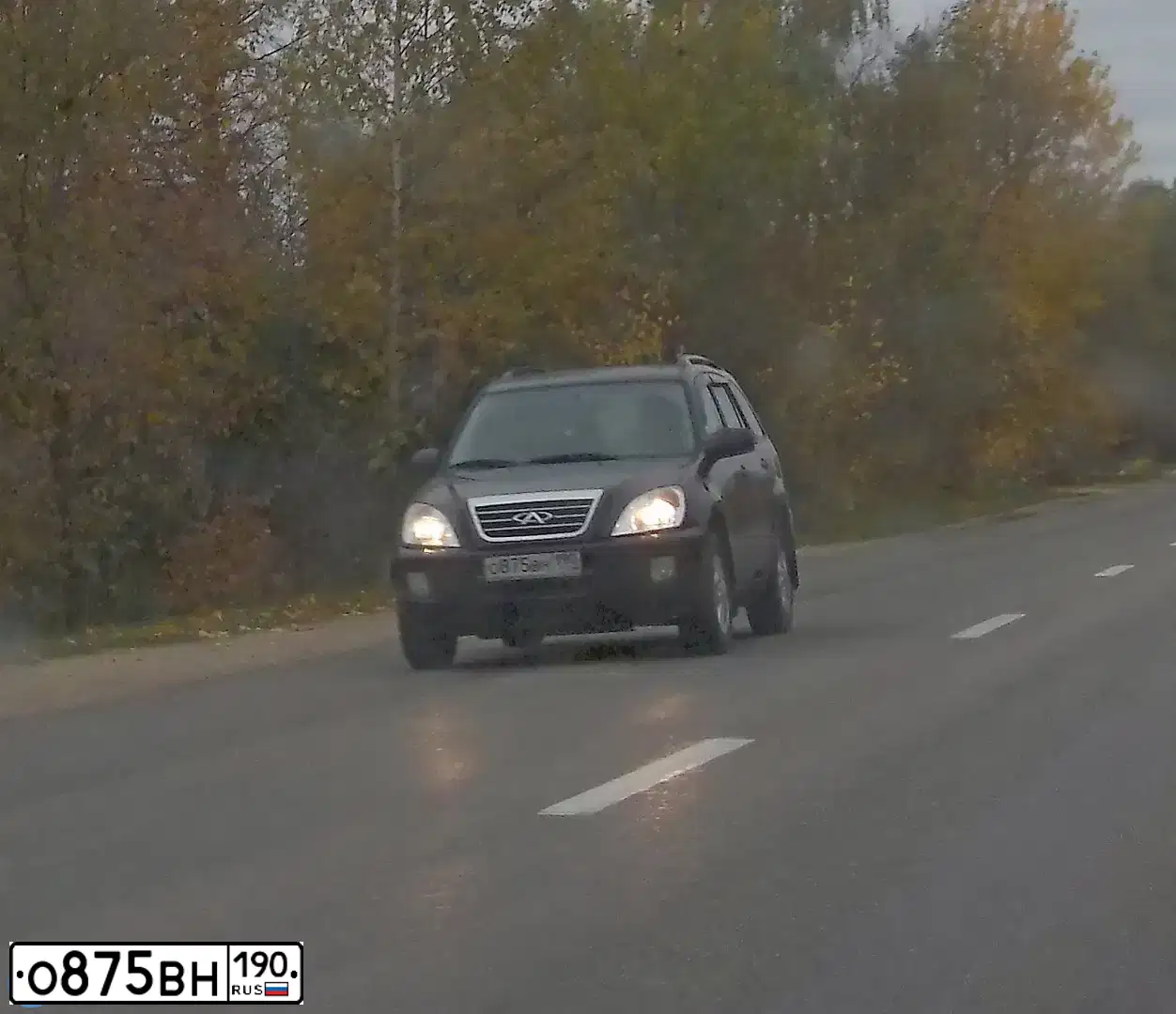 Фото автомобиля TAGAZ TINGO, 2010 — госномер Р145ЕР76. Цвет: ЧЕРНЫЙ
