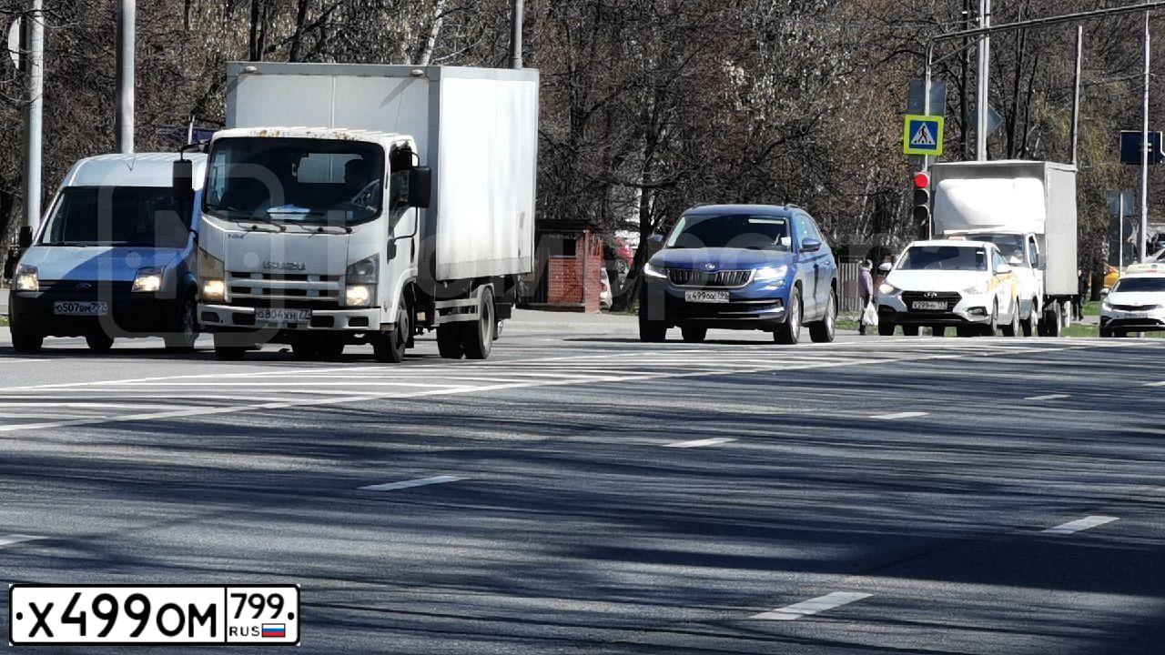 Фото автомобиля KIA RIO, 2010 — госномер Х499ОМ799. Цвет: ЧЕРНЫЙ