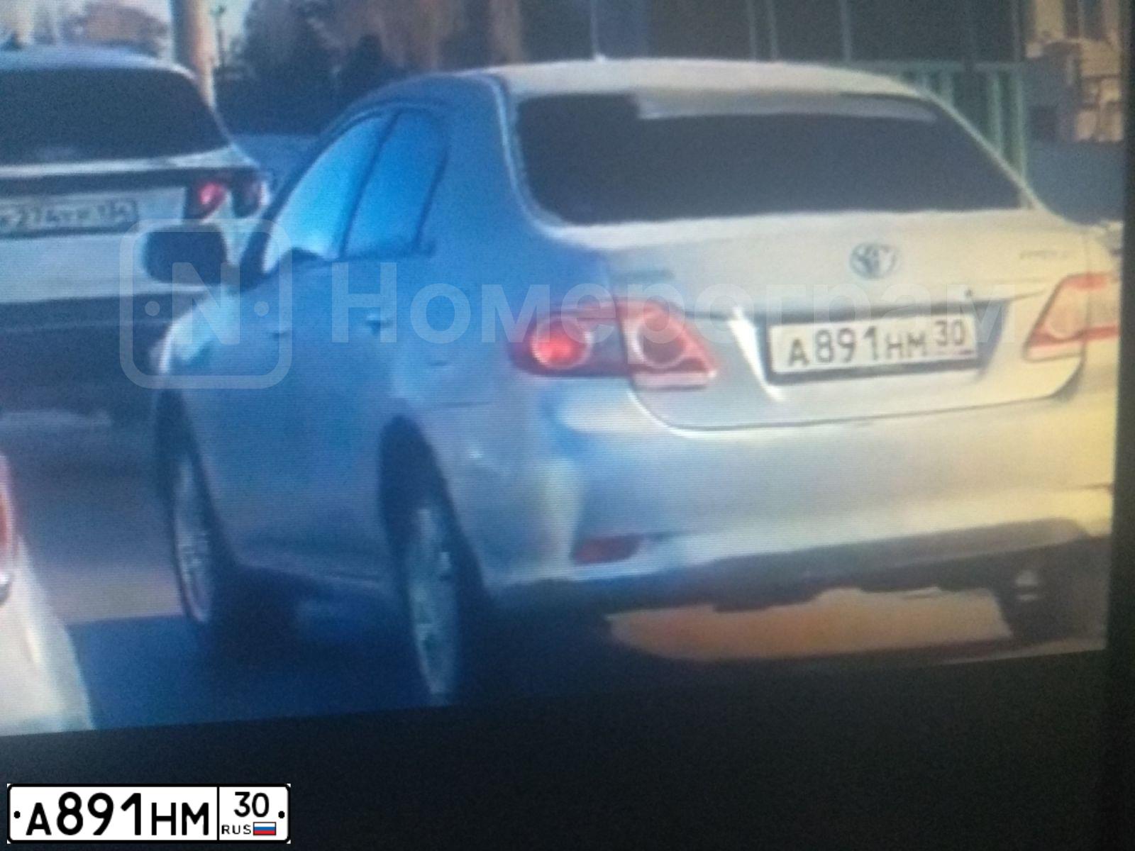 Фото автомобиля TOYOTA COROLLA, 2010 — госномер А891НМ30. Цвет: Серебристый