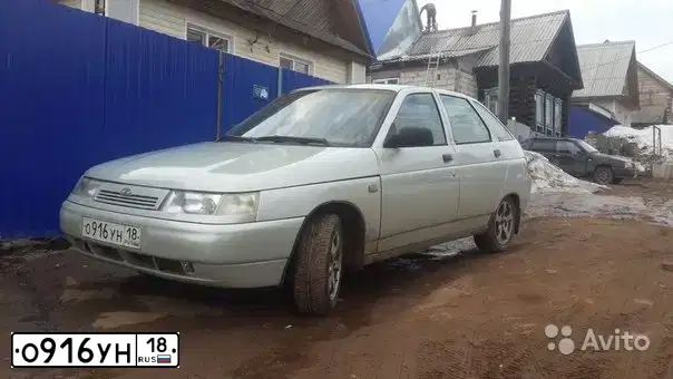 Фото автомобиля LADA 2112, 2004 — госномер К446ОС18. Цвет: СЕРЕБРИСТЫЙ