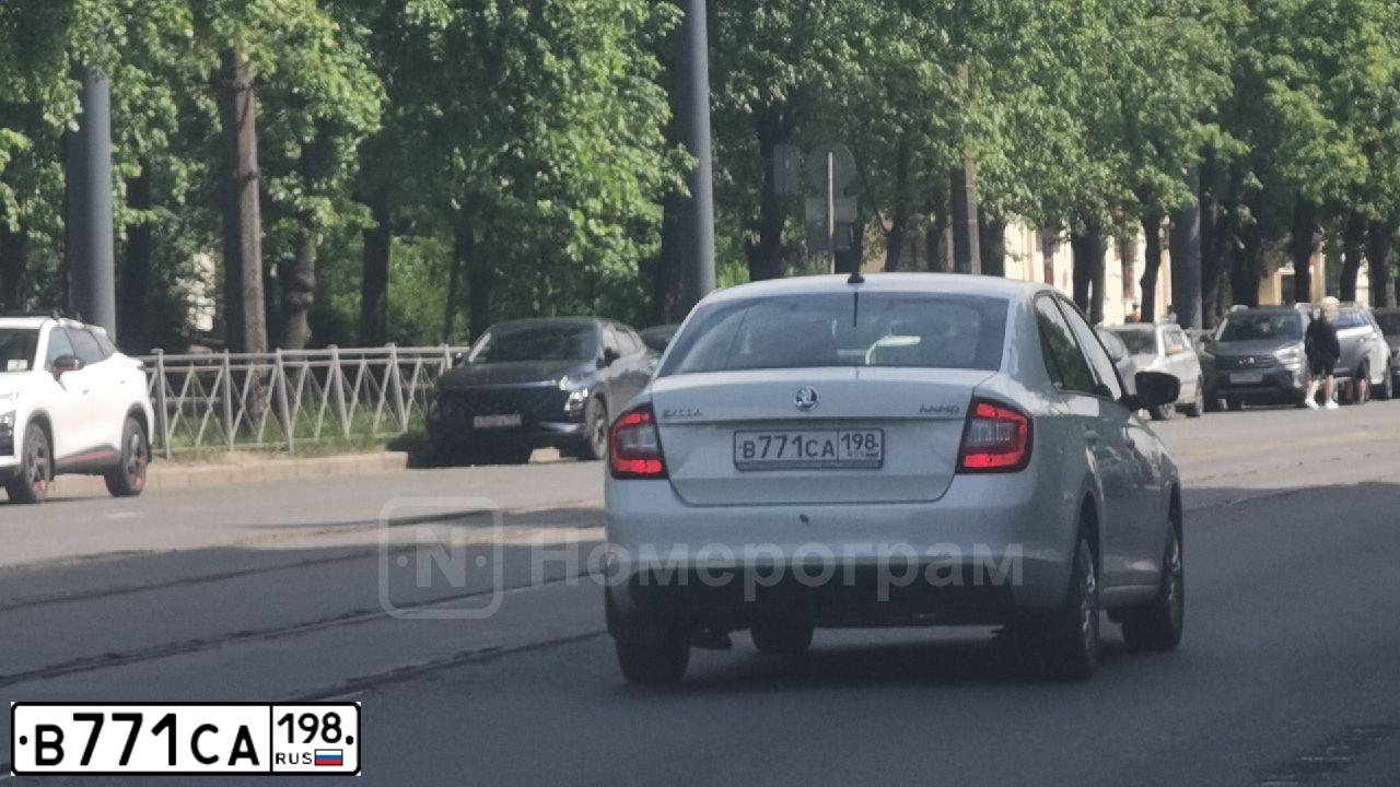 Фото автомобиля SKODA RAPID, 2019 — госномер В771СА198. Цвет: БЕЛЫЙ