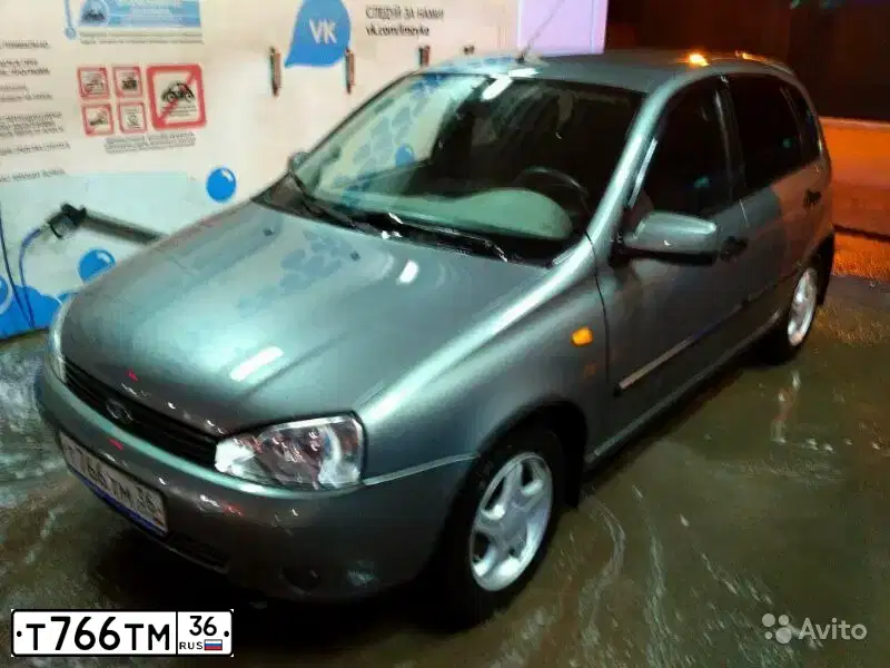 Фото автомобиля LADA 1119 KALINA, 2011 — госномер Т766ТМ36. Цвет: Темно-серый металлик