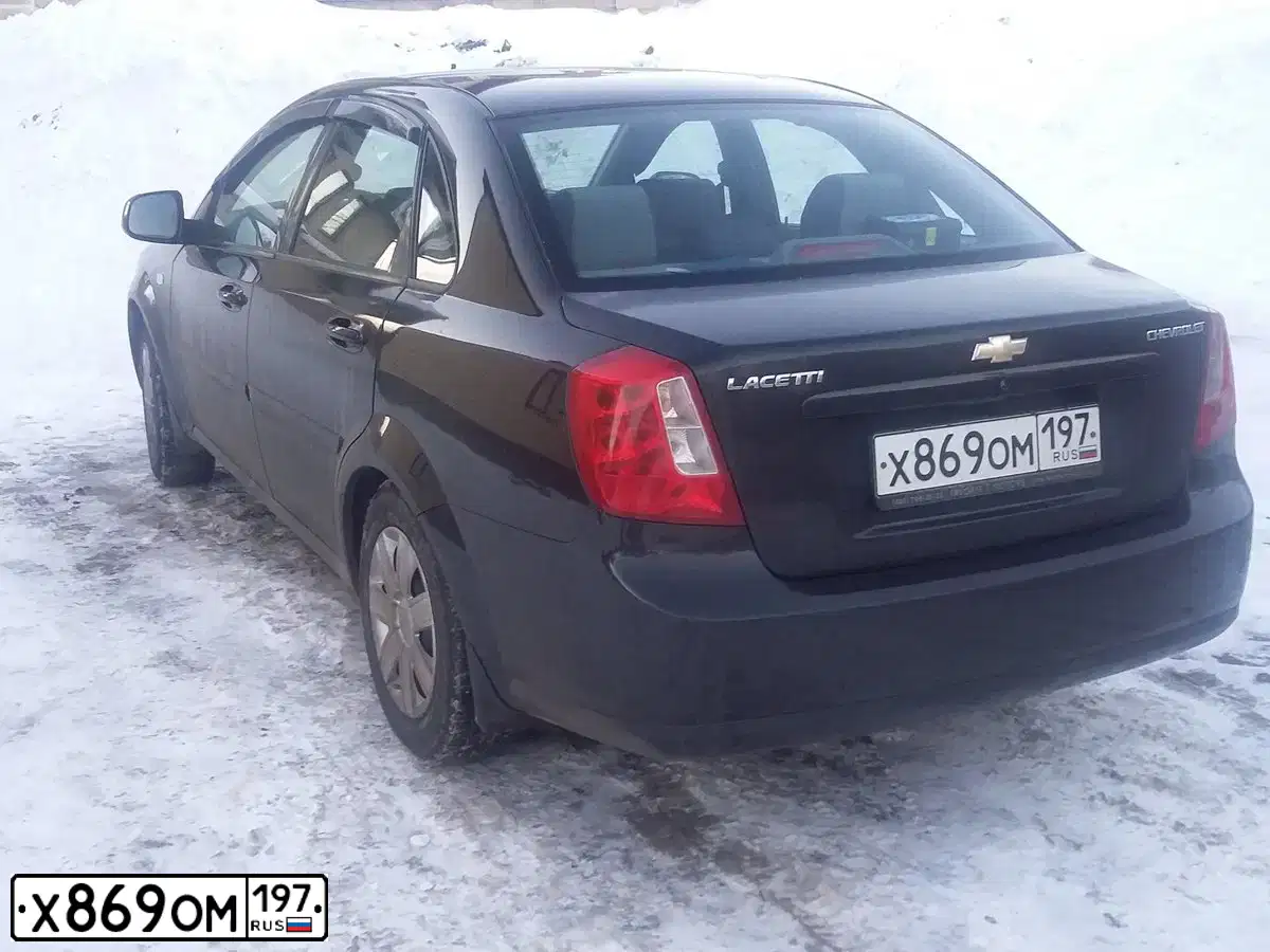 Фото автомобиля CHEVROLET LACETTI, 2011 — госномер Х869ОМ197. Цвет: ЧЕРНЫЙ