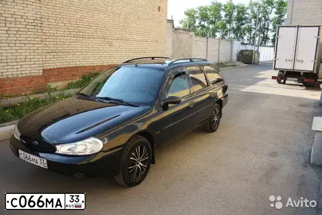 Фото автомобиля FORD MONDEO, 1997 — госномер Е666УХ33. Цвет: ЧЕРНЫЙ