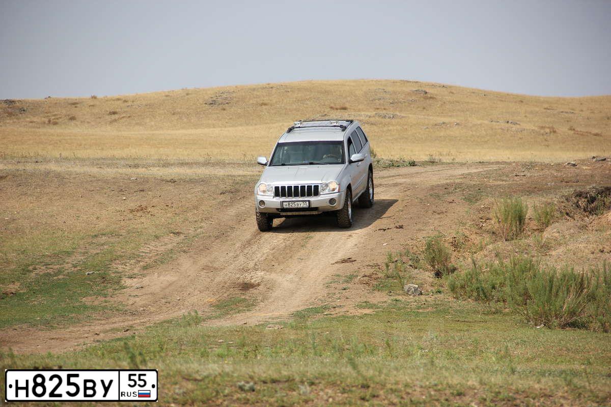 Фото автомобиля JEEP GRAND CHEROKEE, 2006 — госномер К166ТС196. Цвет: СЕРЕБРИСТЫЙ