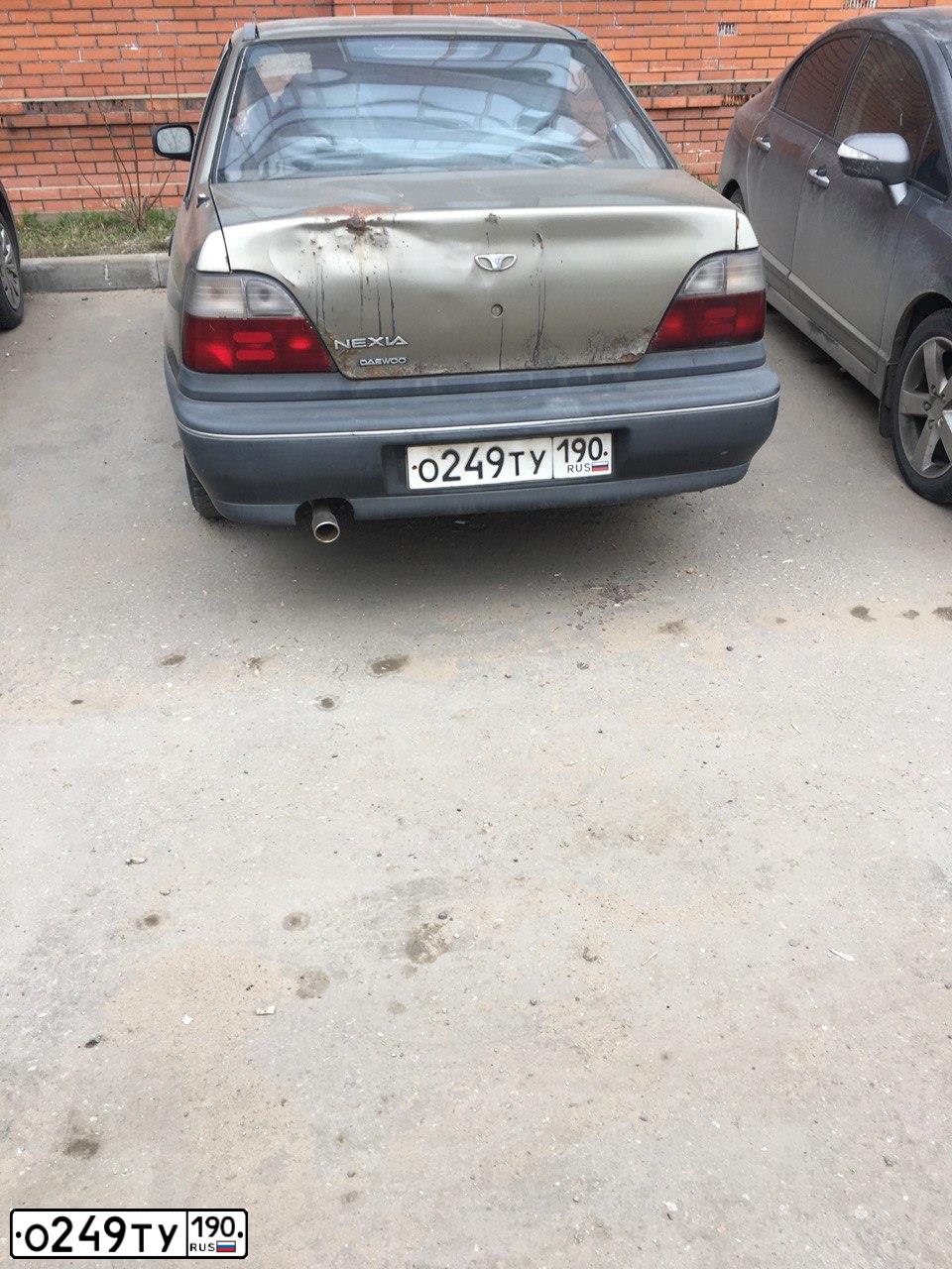 Фото автомобиля DAEWOO NEXIA, 2001 — госномер О249ТУ190. Цвет: КОРИЧНЕВЫЙ