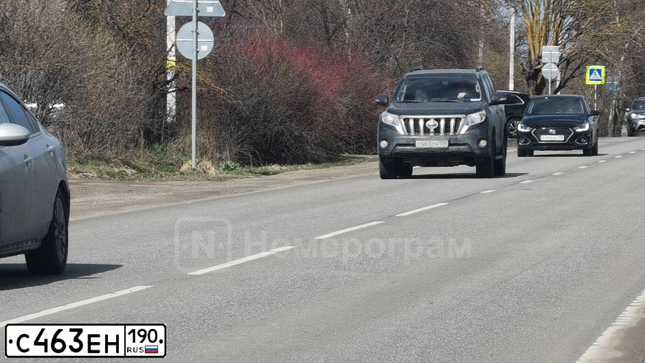 Фото автомобиля VOLKSWAGEN TIGUAN, 2010 — госномер М675МТ21. Цвет: ЧЕРНЫЙ