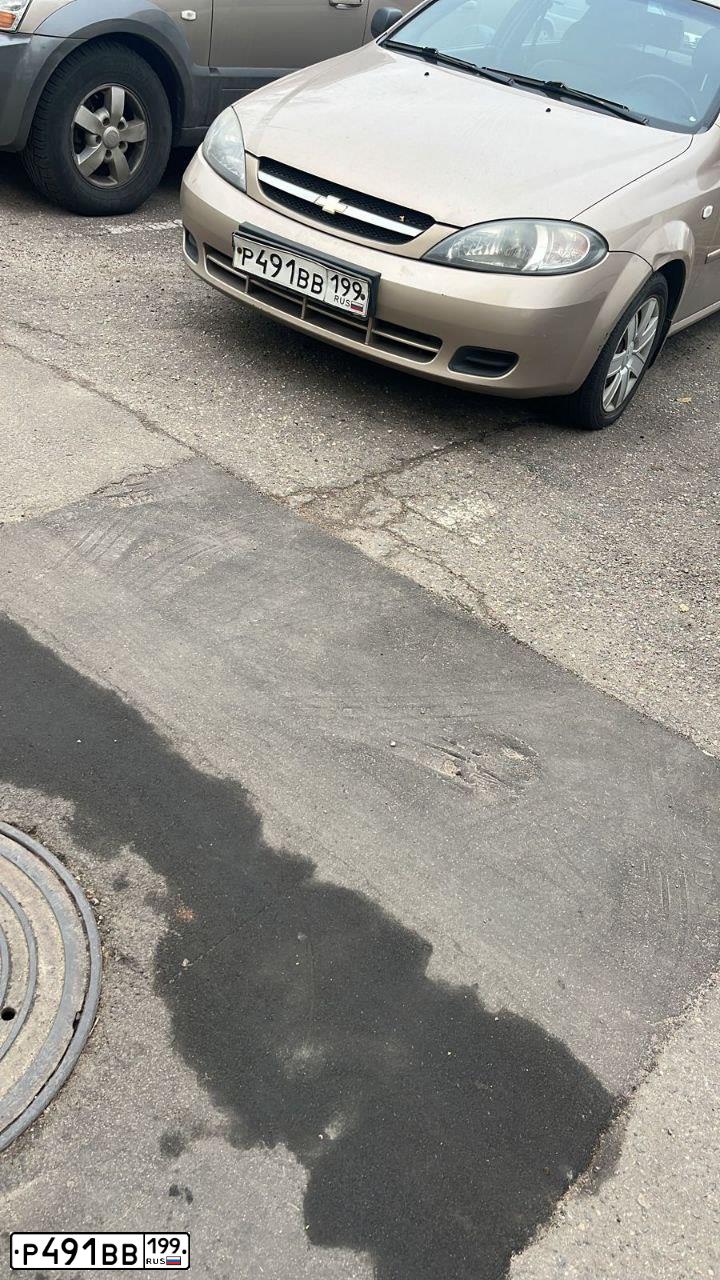 Фото автомобиля CHEVROLET LACETTI, 2007 — госномер Р491ВВ199. Цвет: БЕЖЕВЫЙ