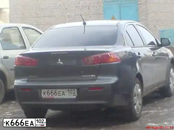 Фото автомобиля MITSUBISHI LANCER, 2008 — госномер К666ЕА102. Цвет: СЕРЫЙ