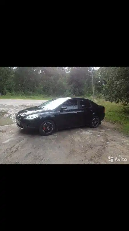 Фото автомобиля FORD FOCUS, 2010 — госномер В013РК51. Цвет: ЧЕРНЫЙ