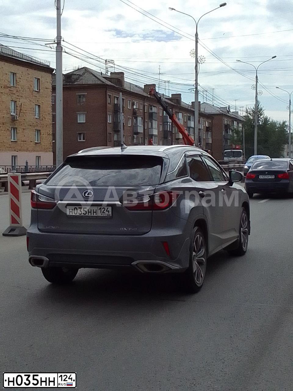 Фото автомобиля TOYOTA RAV4, 2013 — госномер Н035НН124. Цвет: СЕРЫЙ