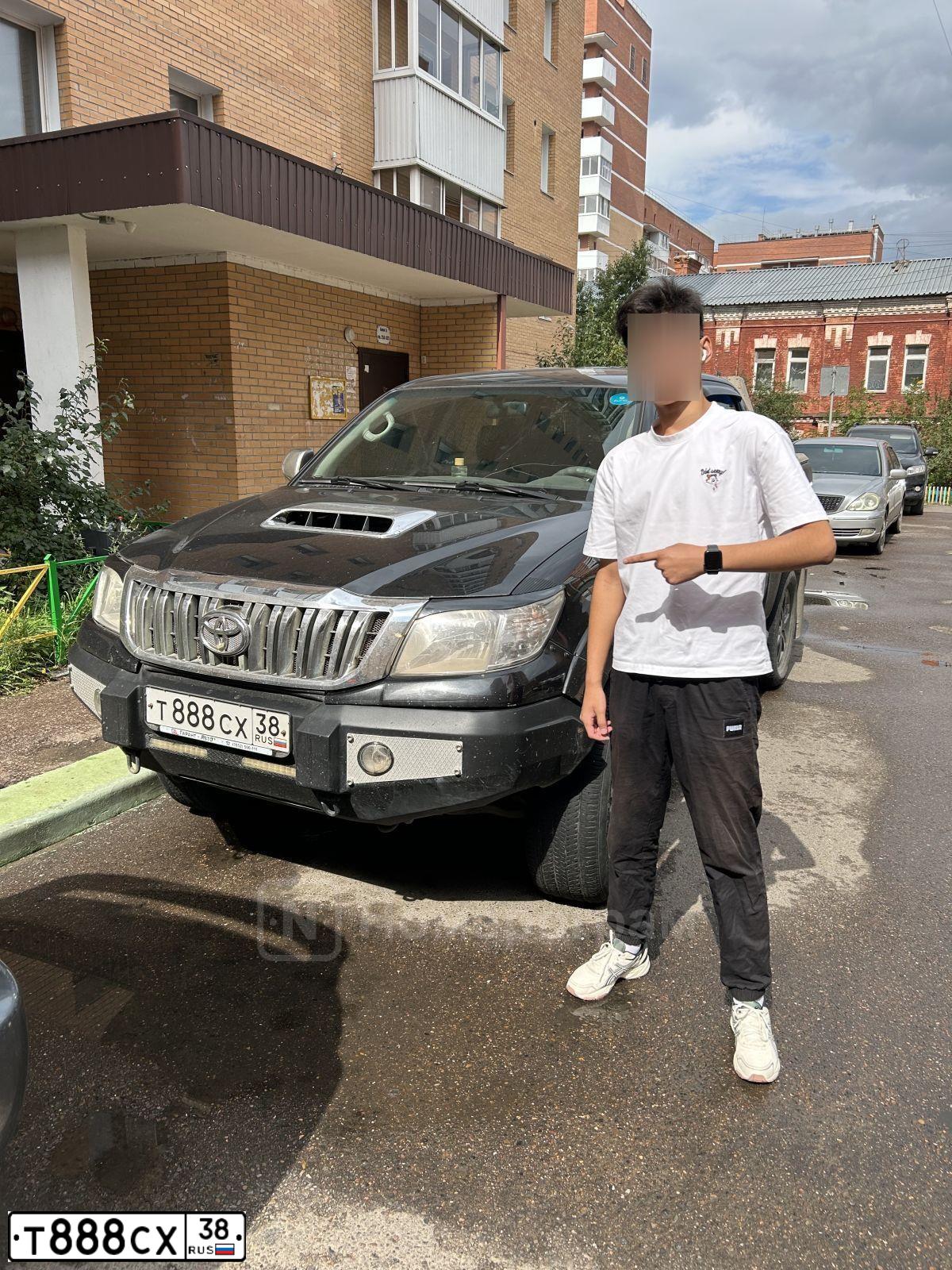 Фото автомобиля TOYOTA HILUX, 2012 — госномер Х333ТВ38. Цвет: ЧЕРНЫЙ