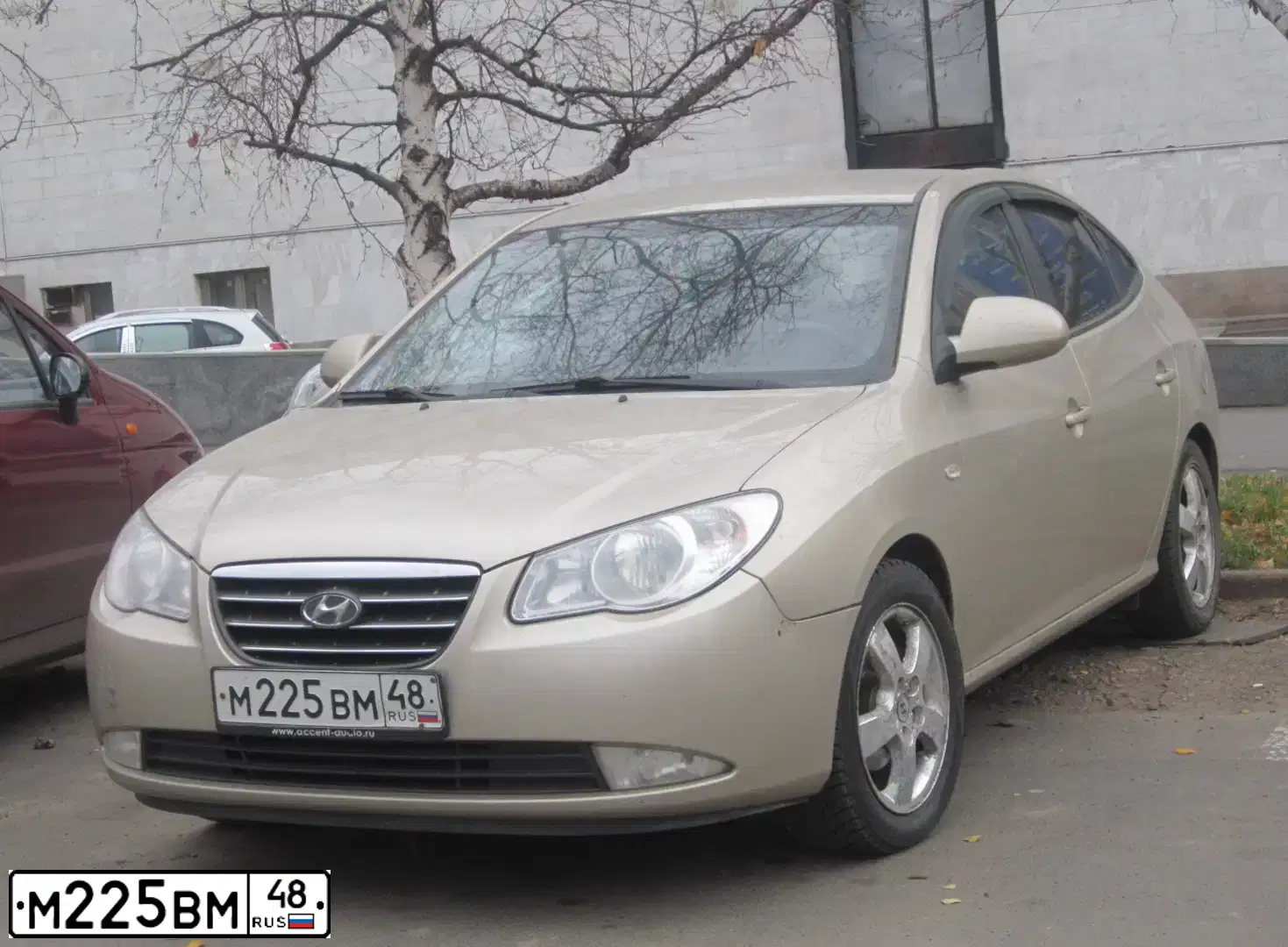 Фото автомобиля HYUNDAI ELANTRA, 2006 — госномер О414ХХ68. Цвет: ЖЕЛТО-ПЕСОЧНЫЙ