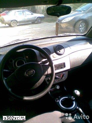 Фото автомобиля LIFAN SMILY, 2012 — госномер Х302ХС64. Цвет: СЕРЫЙ