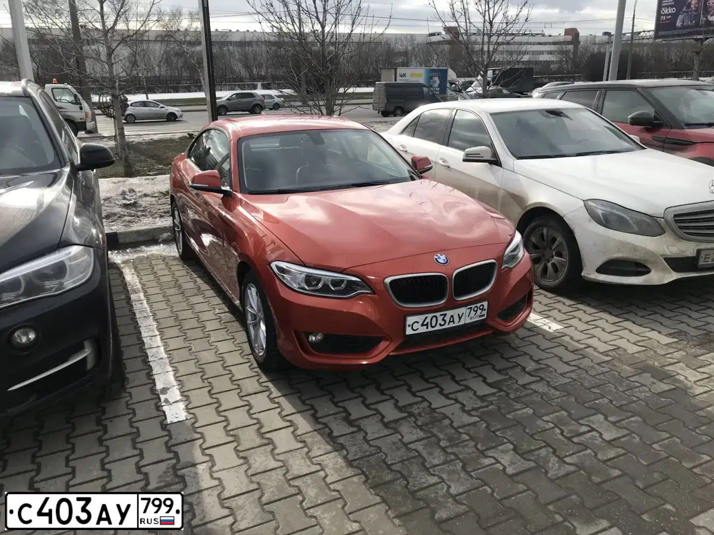 Фото автомобиля BMW SERIE 2, 2017 — госномер С403АУ799. Цвет: ОРАНЖЕВЫЙ