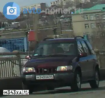 Фото автомобиля KIA SPORTAGE, 2006 — госномер М343ХА64. Цвет: ТЕМНО КРАСНЫЙ