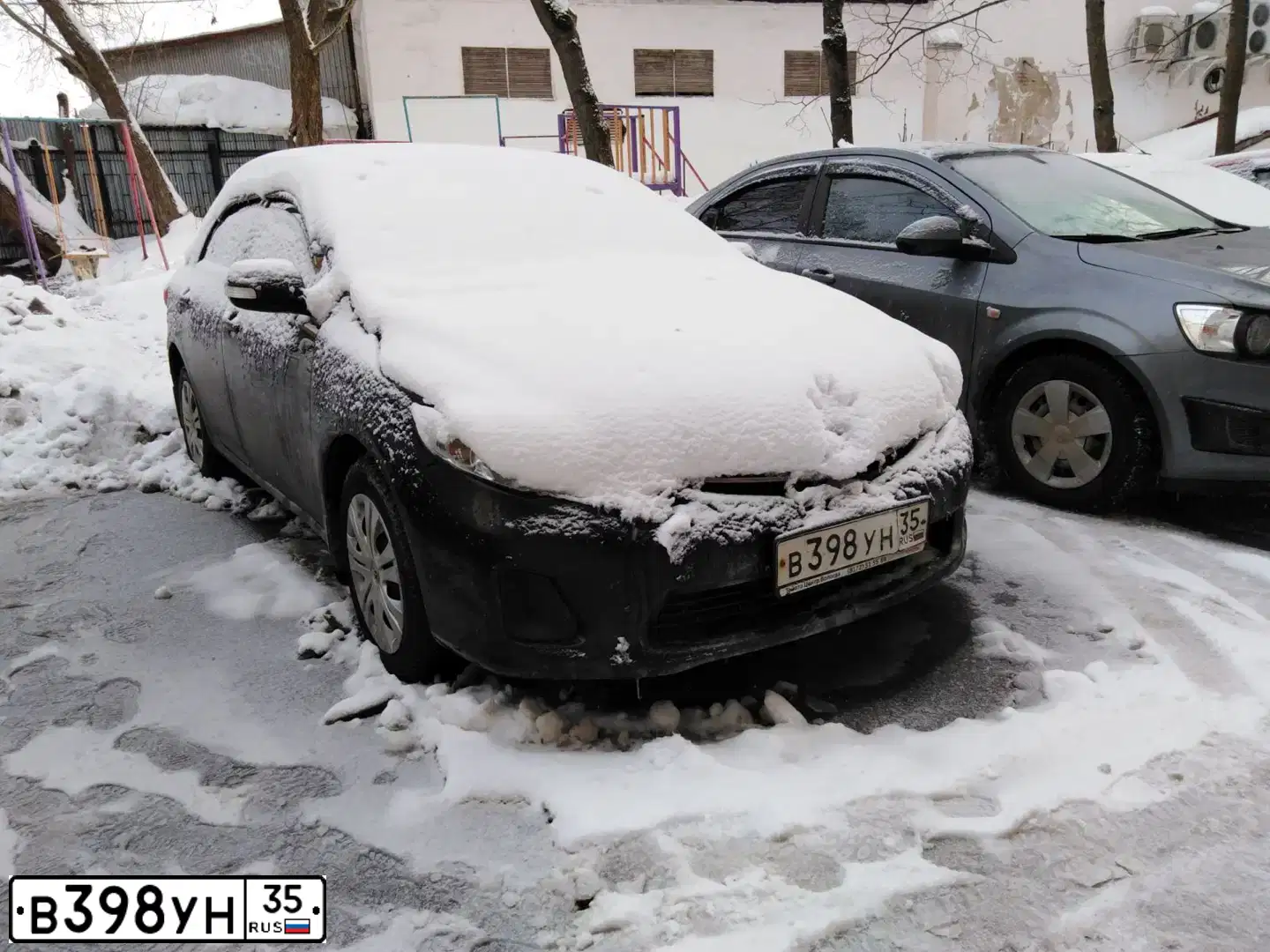 Фото автомобиля TOYOTA COROLLA, 2012 — госномер К768МВ21. Цвет: ЧЕРНЫЙ