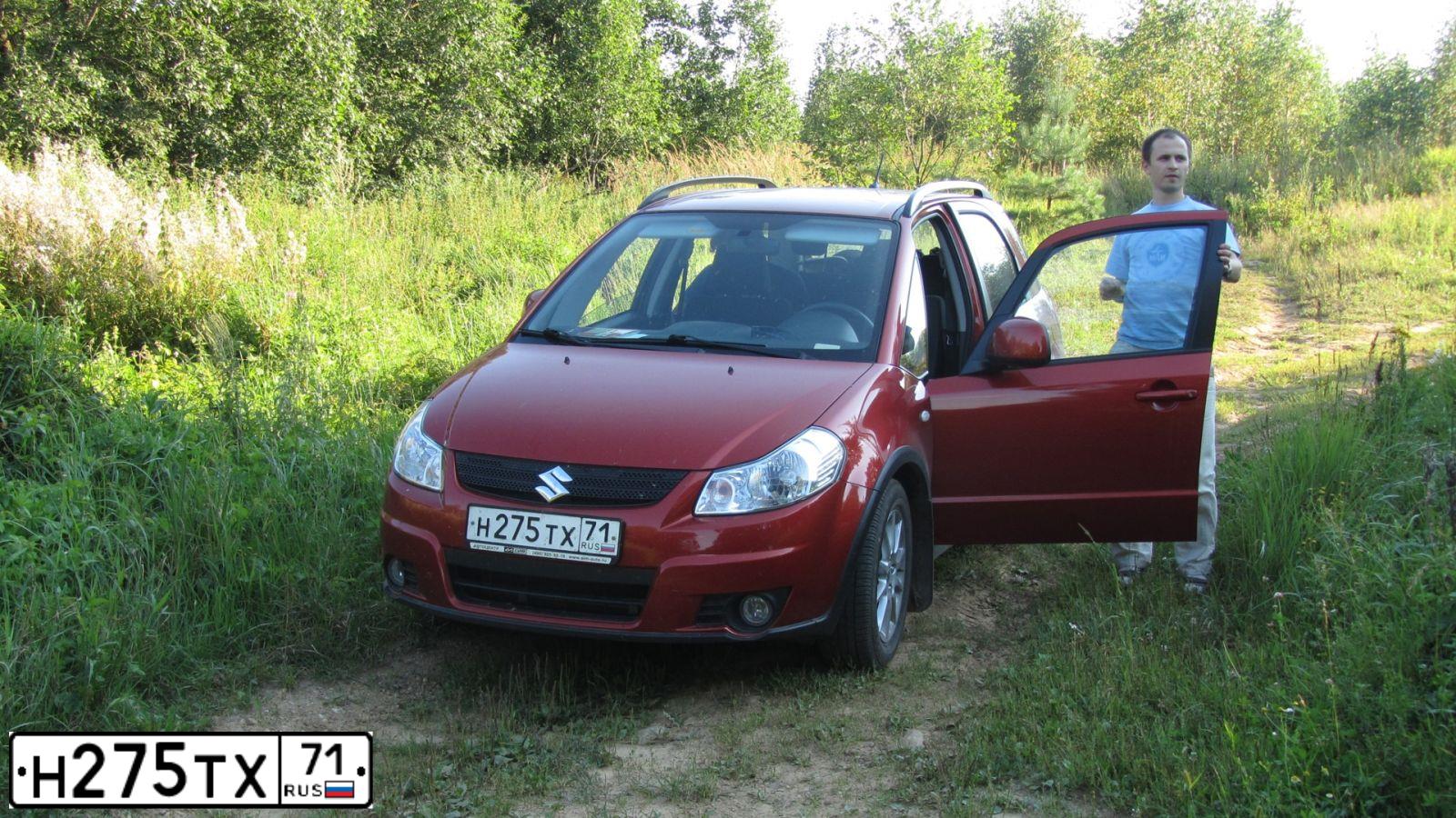 Фото автомобиля SUZUKI SX 4, 2008 — госномер Н275ТХ71. Цвет: Оранжевый