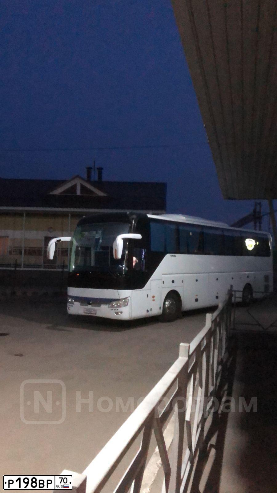 Фото автомобиля YUTONG 6119, 2019 — госномер Р198ВР70. Цвет: Белый