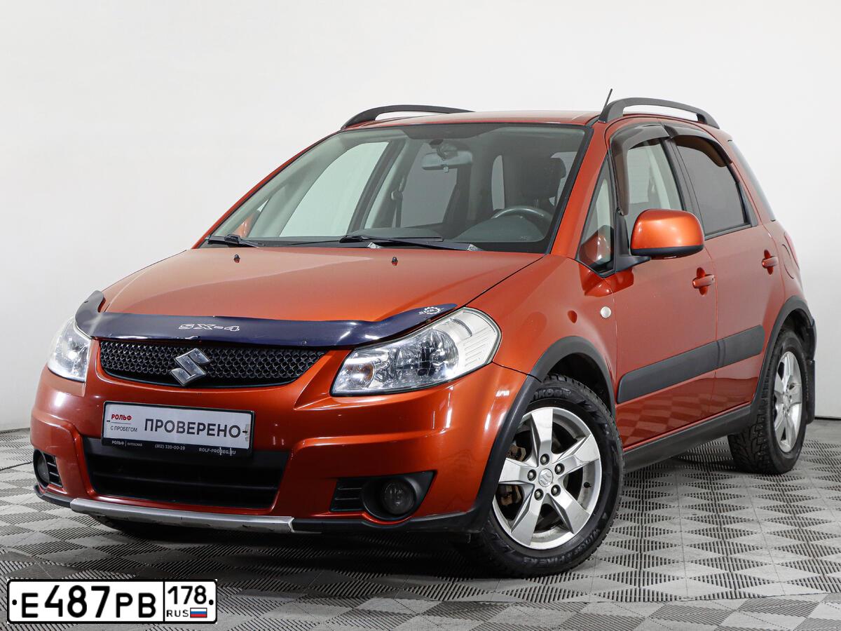 Фото автомобиля SUZUKI SX 4, 2010 — госномер Е487РВ178. Цвет: ОРАНЖЕВЫЙ