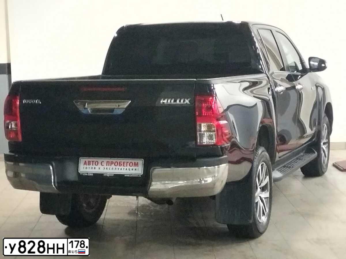 Фото автомобиля TOYOTA HILUX, 2016 — госномер О100ОХ95. Цвет: ЧЕРНЫЙ