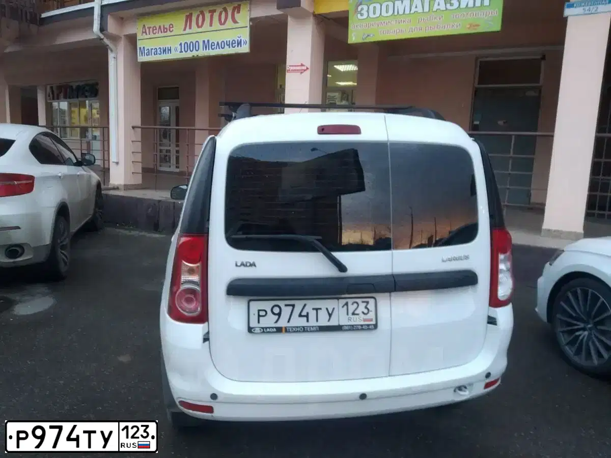 Фото автомобиля LADA LARGUS, 2018 — госномер Р974ТУ123. Цвет: Белый