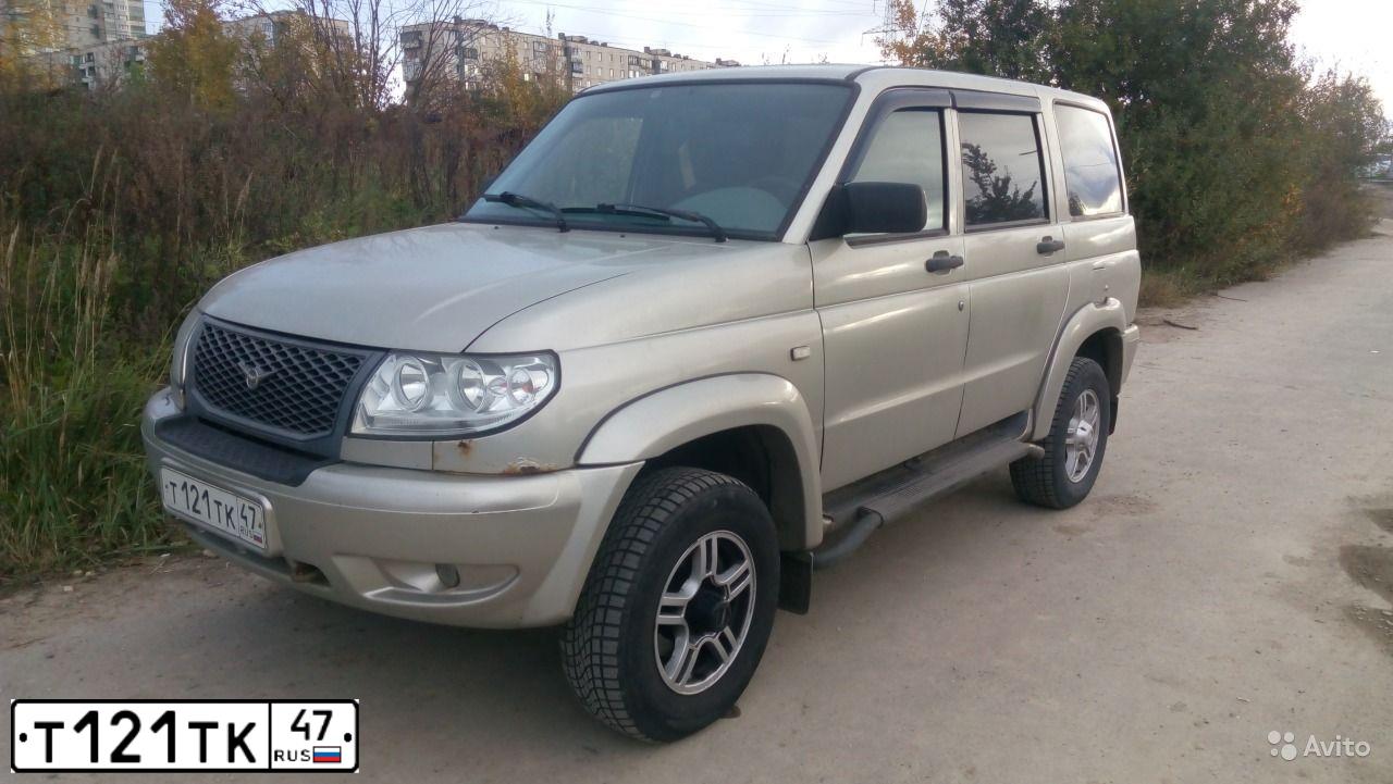 Фото автомобиля UAZ 3163 PATRIOT, 2010 — госномер С061РК198. Цвет: Серебристо-желтый металлик