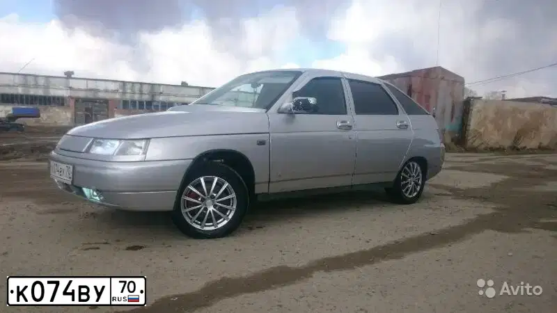 Фото автомобиля LADA 2112, 2005 — госномер Р403КВ186. Цвет: Светло-Серебристый металлик