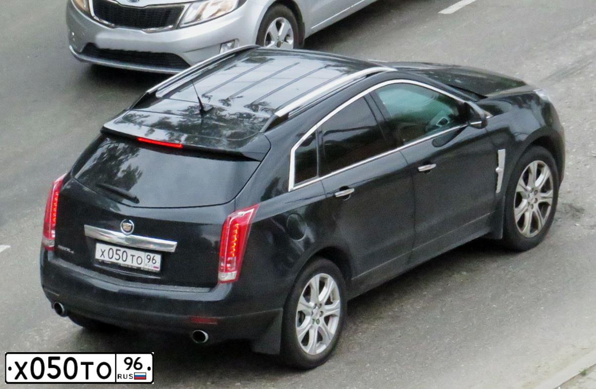 Фото автомобиля CADILLAC SRX, 2011 — госномер Х050ТО96. Цвет: ЧЕРНЫЙ