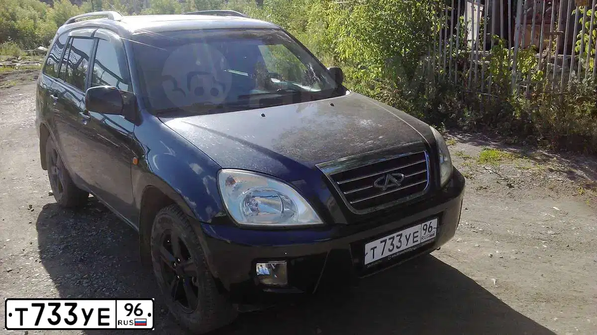Фото автомобиля CHERY TIGGO, 2008 — госномер Е521ВТ774. Цвет: Темно-зеленый