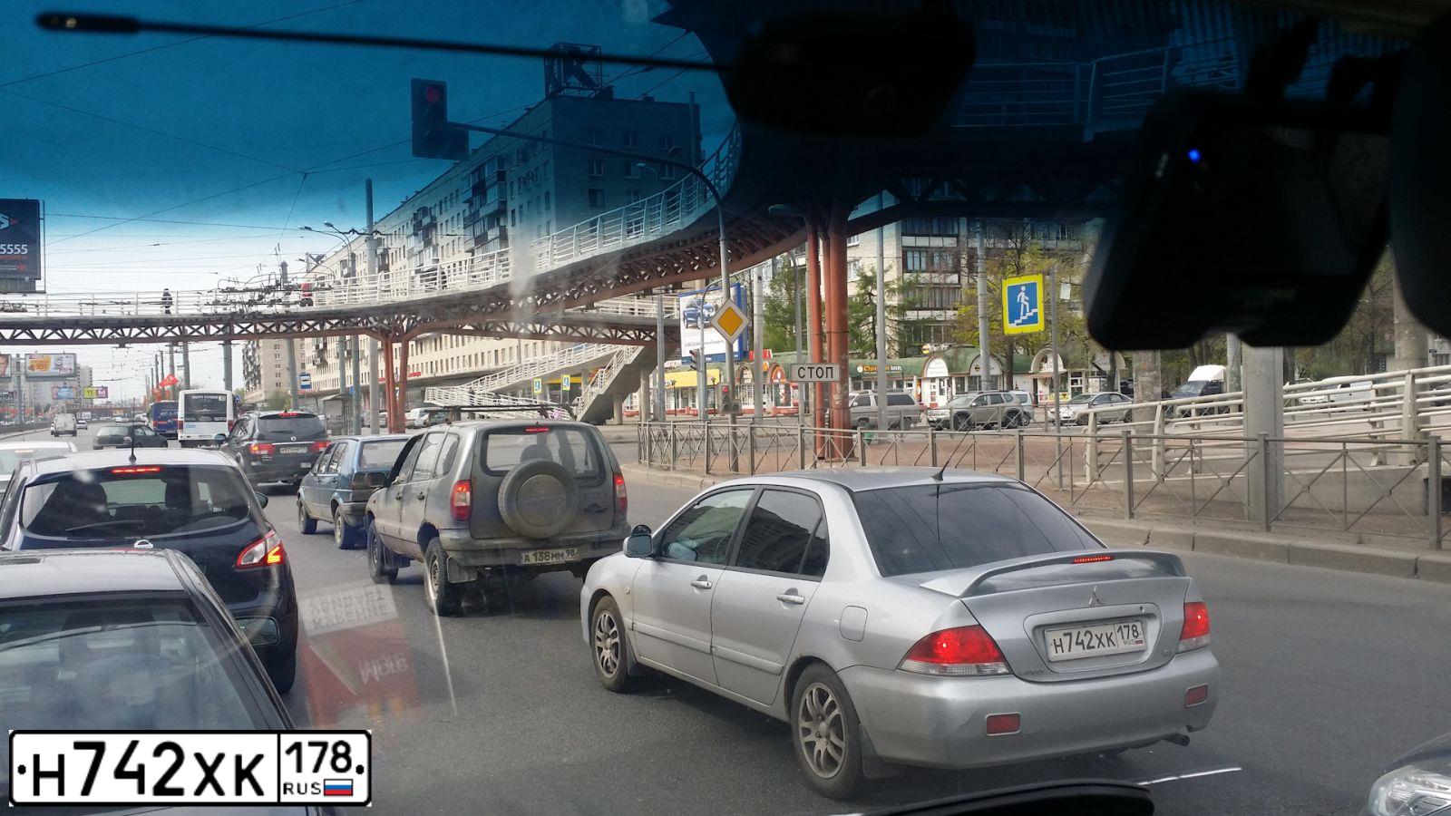 Фото автомобиля MITSUBISHI LANCER, 2005 — госномер К035ВР53. Цвет: СЕРЕБРИСТЫЙ