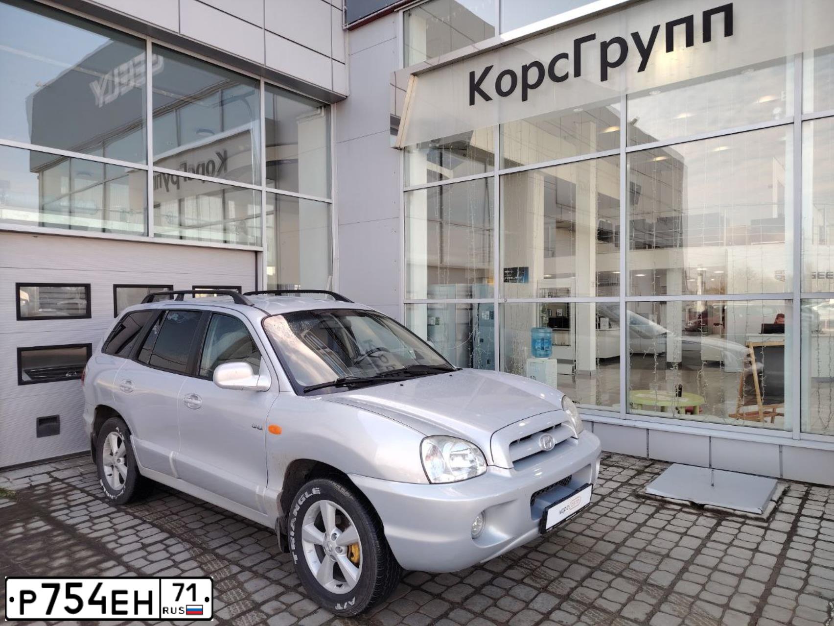 Фото автомобиля HYUNDAI SANTA FE, 2009 — госномер С016МХ57. Цвет: Серебристый