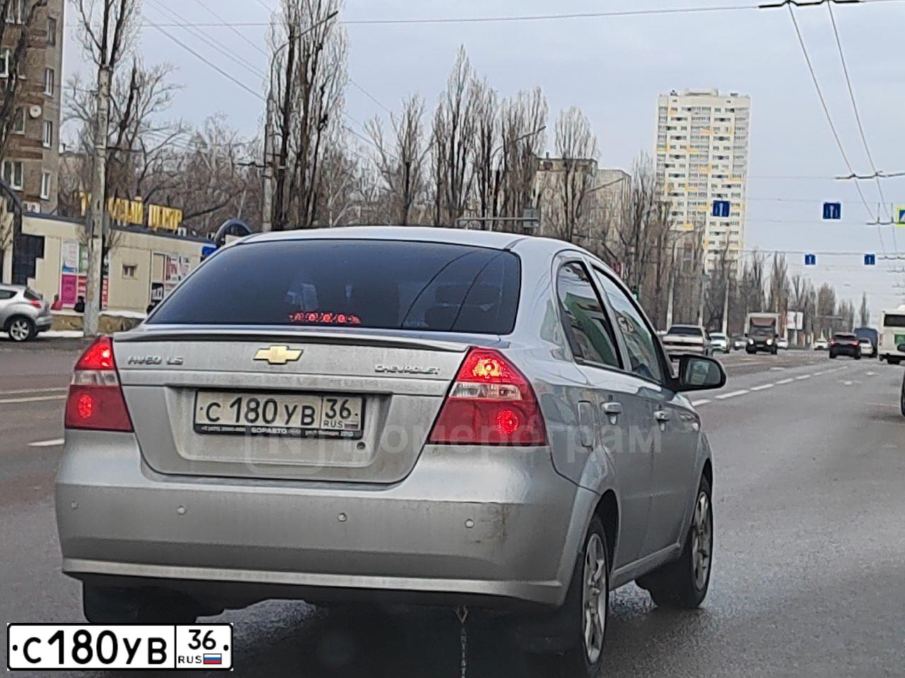 Фото автомобиля CHEVROLET AVEO, 2010 — госномер Е878МА797. Цвет: СЕРЕБРИСТЫЙ