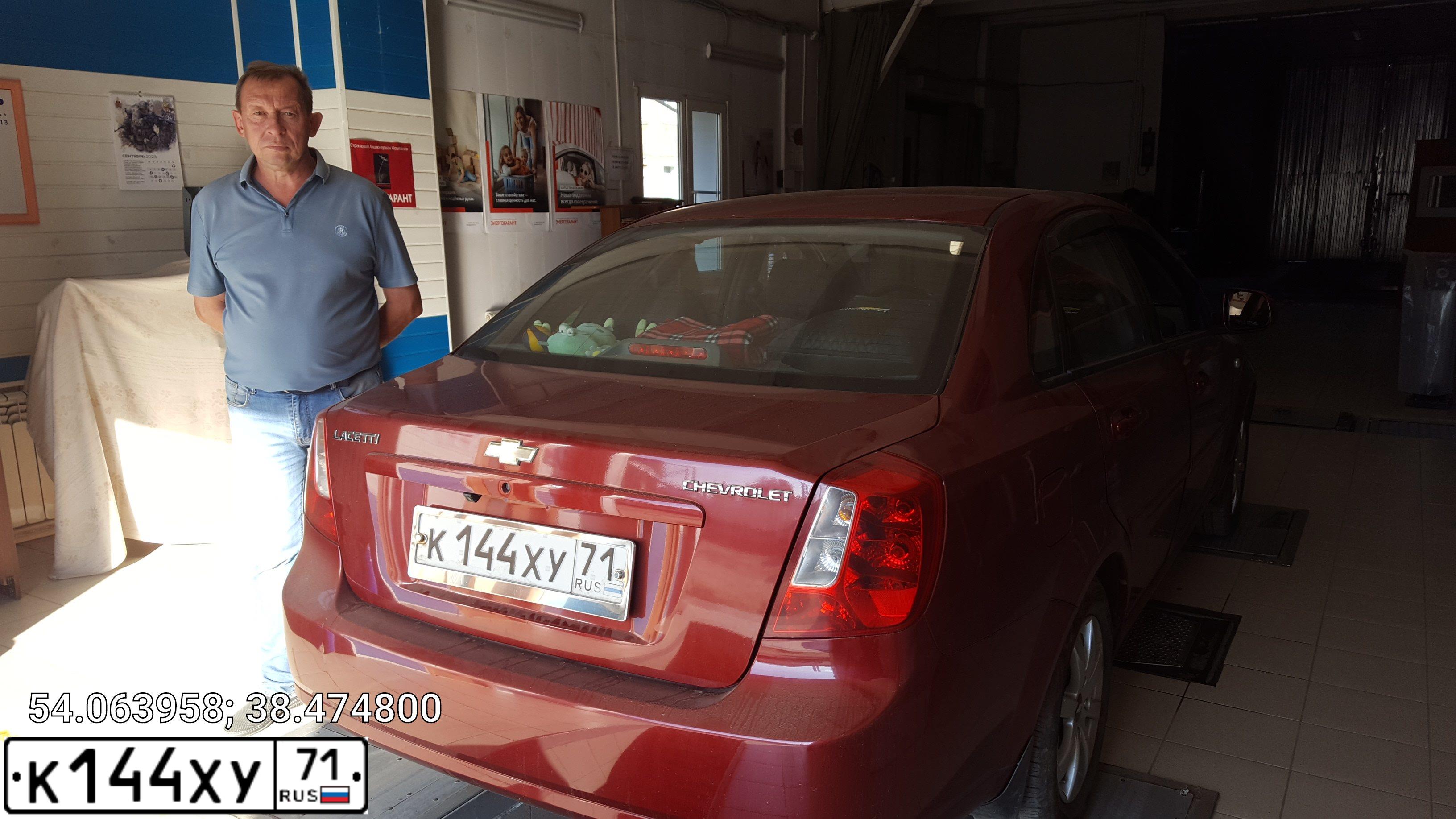 Фото автомобиля CHEVROLET LACETTI, 2010 — госномер К144ХУ71. Цвет: КРАСНЫЙ