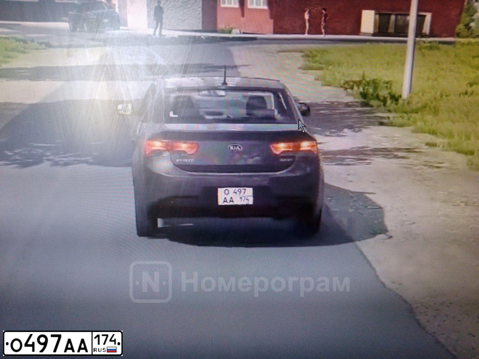 Фото автомобиля TOYOTA COROLLA, 2005 — госномер О497АА174. Цвет: Серебристый