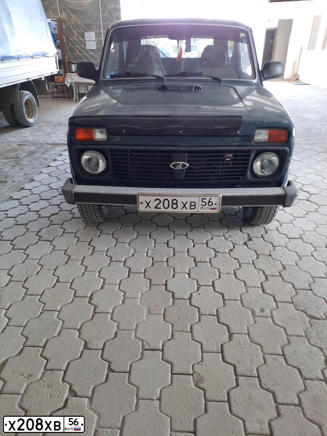 Фото автомобиля LADA 2121 NIVA, 2010 — госномер Х208ХВ56. Цвет: Темно-зеленый