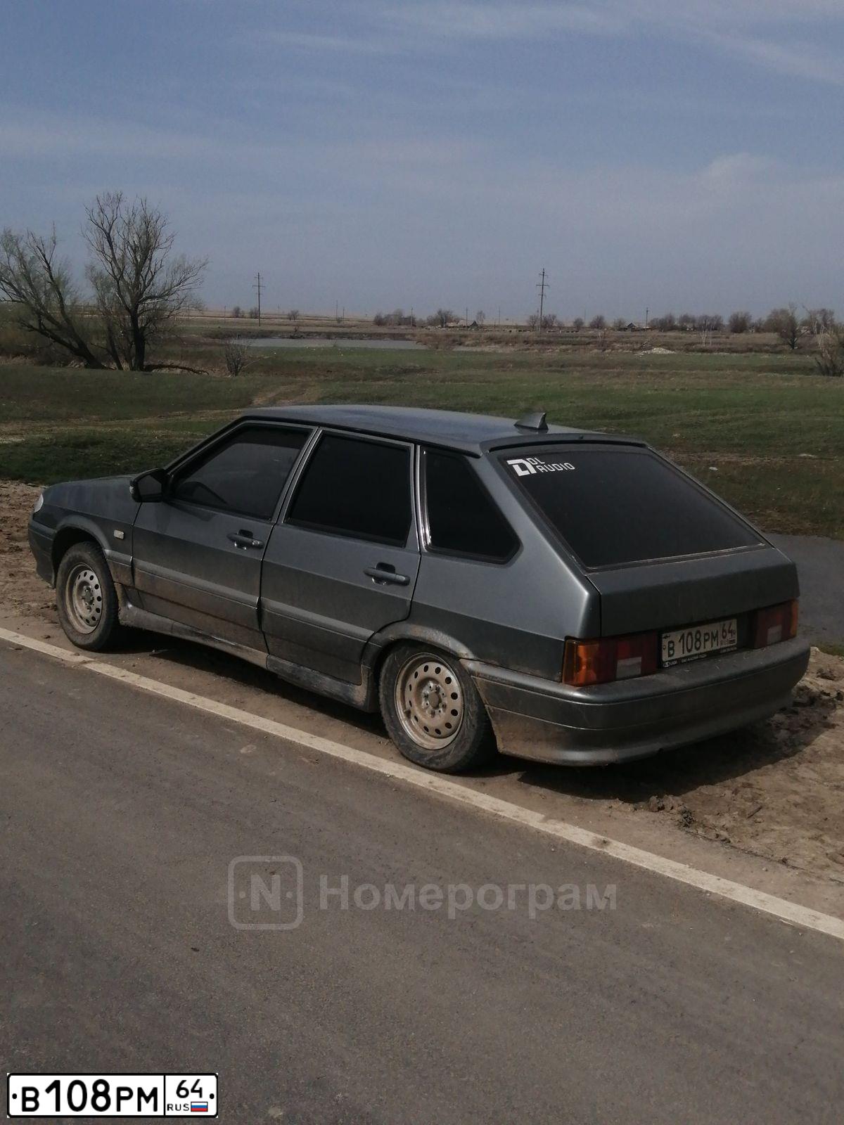 Фото автомобиля LADA 2114 SAMARA, 2009 — госномер В108РМ64. Цвет: СЕРО-ЗЕЛЕНЫЙ МЕТАЛЛИК