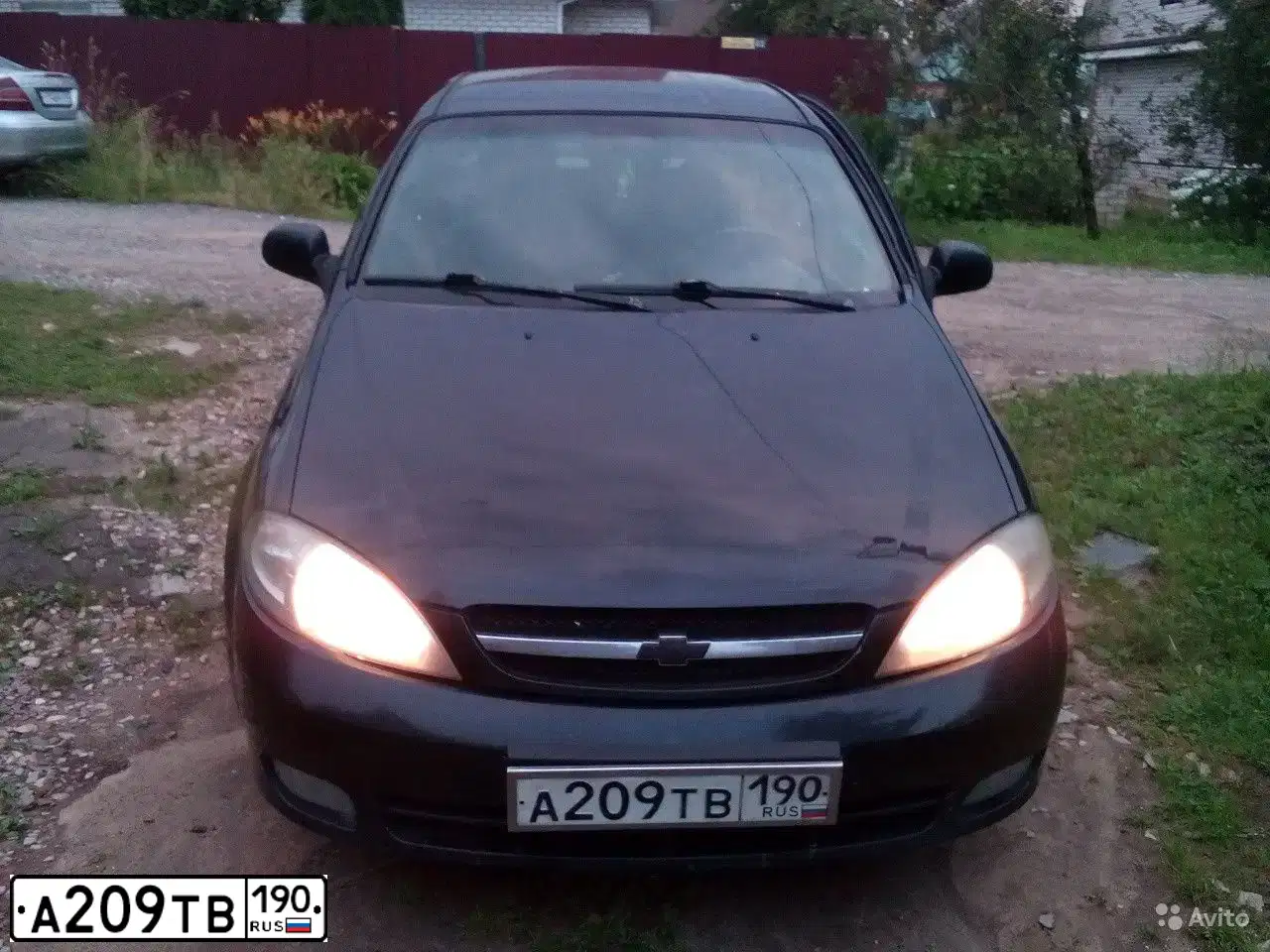 Фото автомобиля CHEVROLET LACETTI, 2006 — госномер А209ТВ190. Цвет: ЧЕРНЫЙ